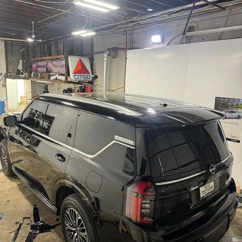 Window tint install: Nissan Armada, side